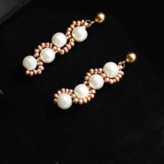 DIY Tutorial: Maak een elegante wave oorbel met glasparels en rocailles