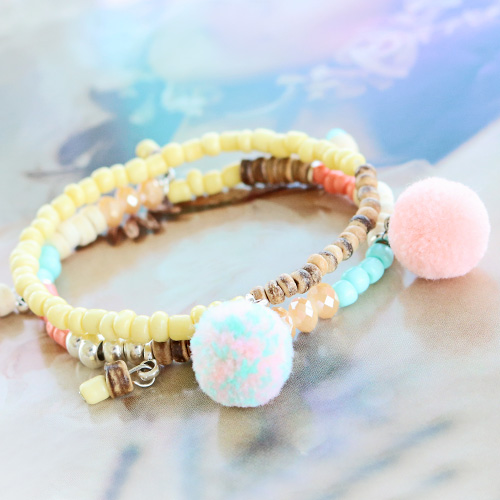 Caribische sieraden met kokos kralen en kleurige kralen