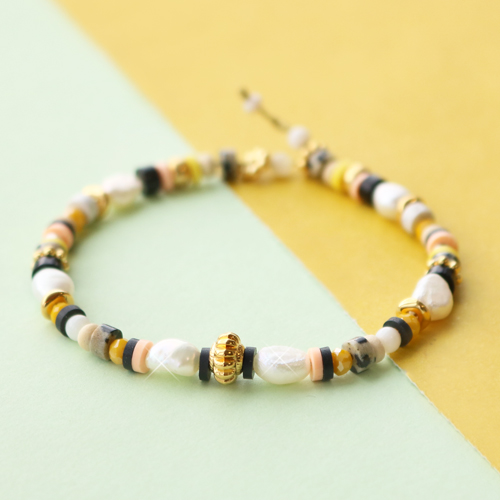 Maak een mooie zomerse sieraden set met deze natuursteen discs kralen: