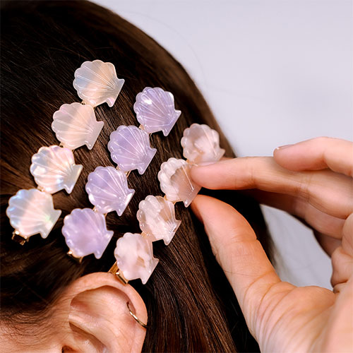 Cre&euml;er unieke zomerlooks met onze haarclips en klemmen