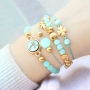 Sieraden in mintgroene tinten van Polaris Elements kralen met gouden details