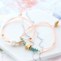 Zomerse armbandjes van elastiek met kleurrijke kralen