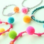 Summer special! Vrolijke pompom bedels in de leukste kleuren
