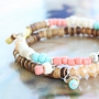 Caribische sieraden met kokos kralen en kleurige kralen