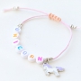 Vrolijke kindersieraden en armbanden met kleurrijke unicorns