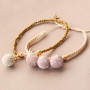 Feestelijke armbandjes met nieuwe glinsterende pompoms