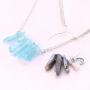 Oorbellen en kettingen met natuursteen druppelvormige kralen en aura quartz crystal