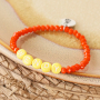 Een vrolijke sieraden set met letterkralen, fimo bedels, houten kralen en Katsuki kralen