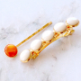 Maak kleurrijke sieraden met kauri schelpjes en zo draag je zomerse haaraccessoires: