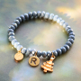 Tips om je top facet armbandjes te versieren met DQ metalen bedels: