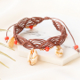 Zo maak je zelf trendy zomerse sieraden met kauri schelpen