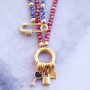 Deze oorbellen, armbanden en ketting maak je eenvoudig zelf met DQ metalen bedels: