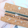 Deze oorbellen, armbanden en ketting maak je eenvoudig zelf met DQ metalen bedels: