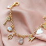 Trendy oorbellen en armbanden met zirkonia bedels en tussenstukken: