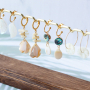 Ontwerp sieraden met een zomerse look met nieuwe schelp bedels 