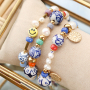 Inspiratie voor het maken van unieke sieraden met handbeschilderde keramiek kralen