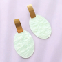 Zo ontwerp je zomerse oorbellen met resin hangers eigen designs