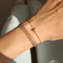 Zo combineer je deze zomer enkelbandjes en armbandjes