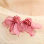 Cre&euml;er een unieke look met bloemen oorbellen
