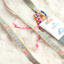 Cre&euml;er unieke armbandjes, sleutelhangers en cadeaus met tekstlint