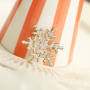Mix & match: cre&euml;er jouw eigen feestlook met pins en broches
