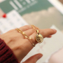 Ontwerp unieke sieraden met rvs bedels met angel numbers