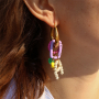 Maak trendy sieraden met gekleurde sleutelhanger onderdelen