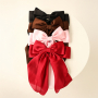 Mix & match jouw collectie met scrunchies & haarspelden met strik