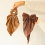 Mix & match jouw collectie met scrunchies & haarspelden met strik