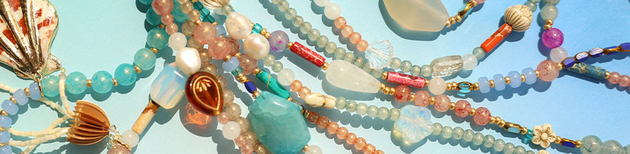 Nieuwe collectie ronde glaskralen met glitter